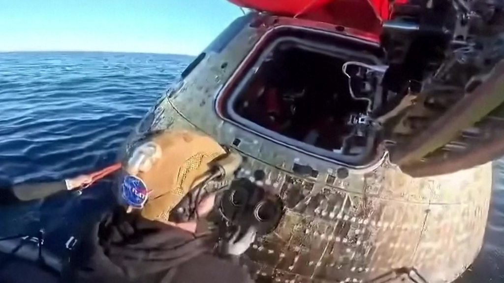 New footage shows joy at Orion capsule hatch being opened
