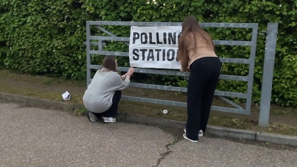 What happens at a polling station before it opens?