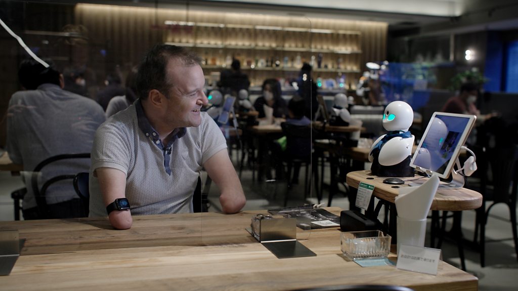 Dining with robots operated by disabled workers in Tokyo