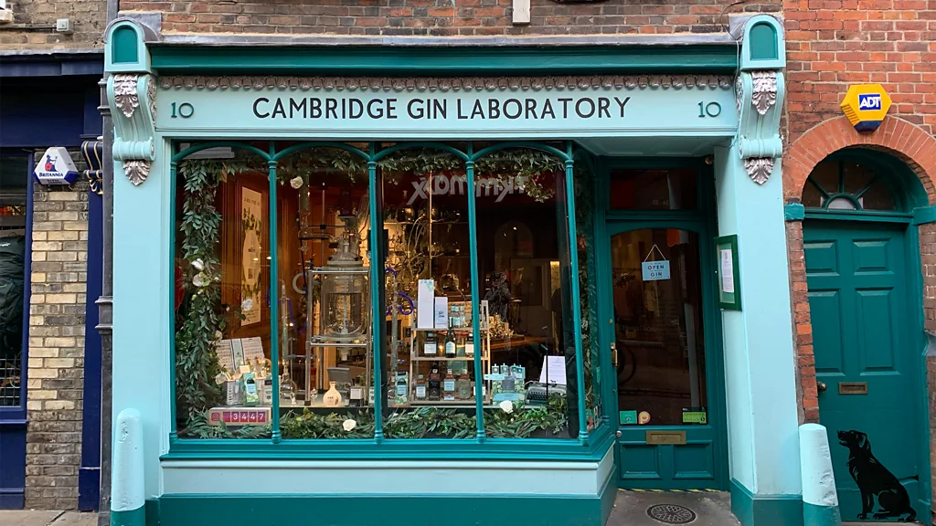 Round bottles in a lab with different ingredients in them (Credit: Cambridge Distillery)