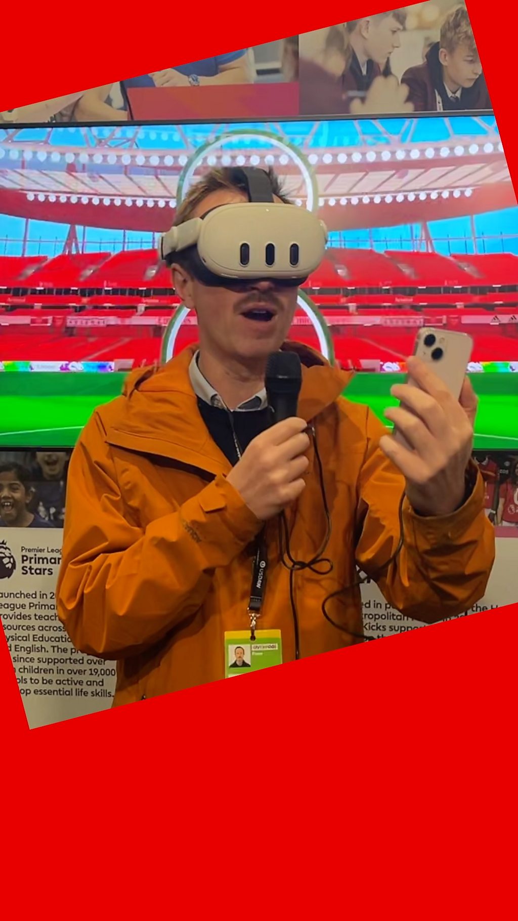 Newscast presenter Adam Fleming tries on a VR headset at the Labour Party Conference