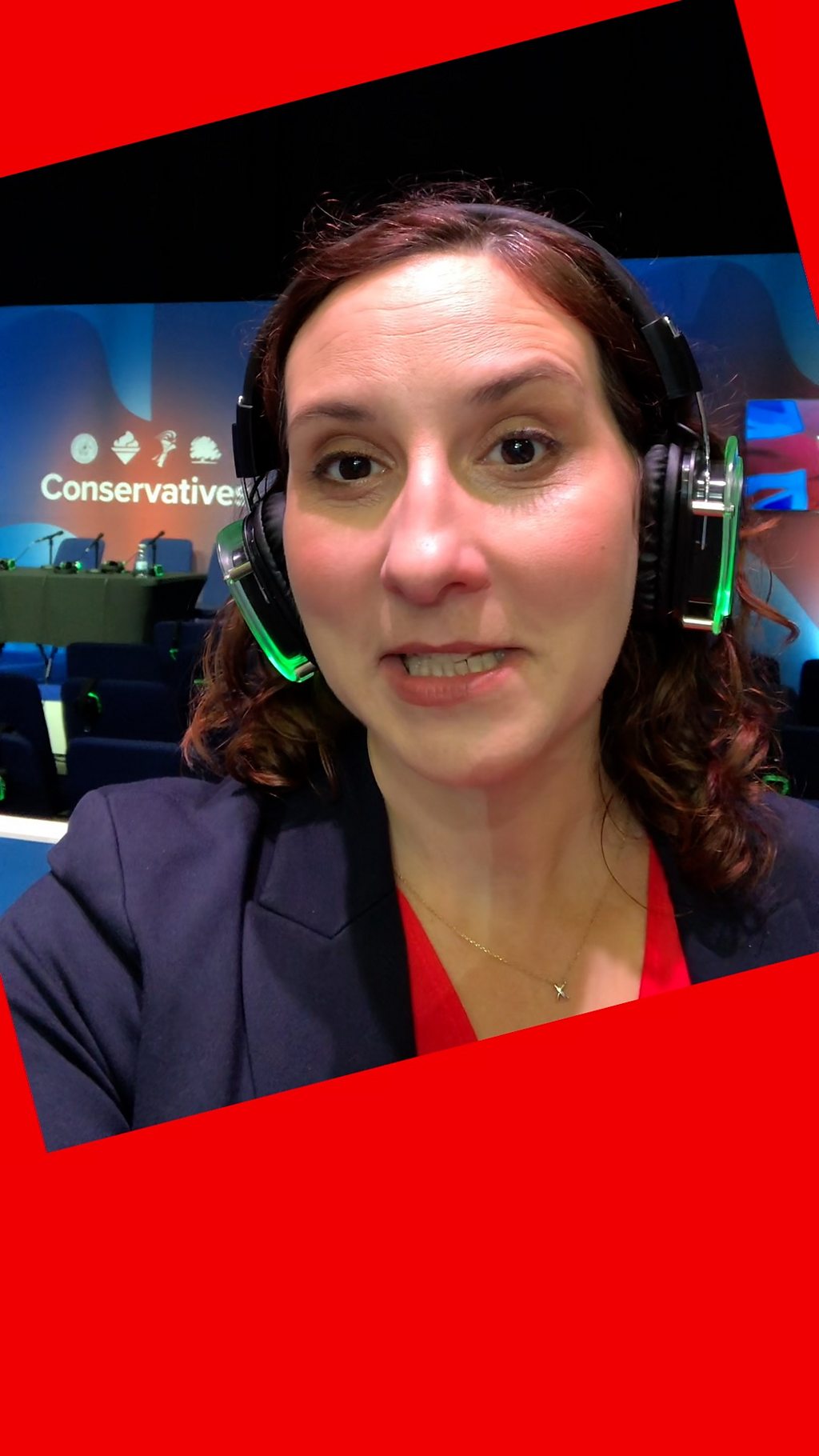 鶹Լ Correspondent, Helen Catt wearing headphones