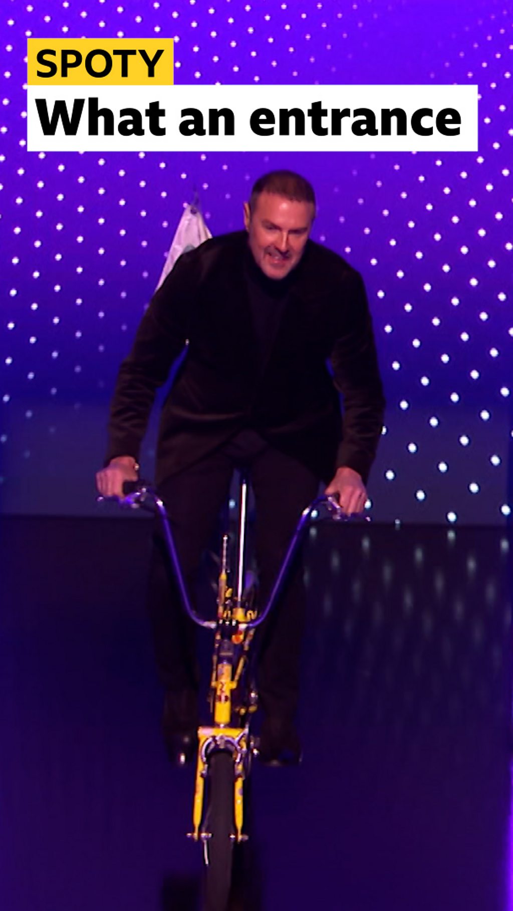 Paddy McGuinness arrives on bike to deliver award