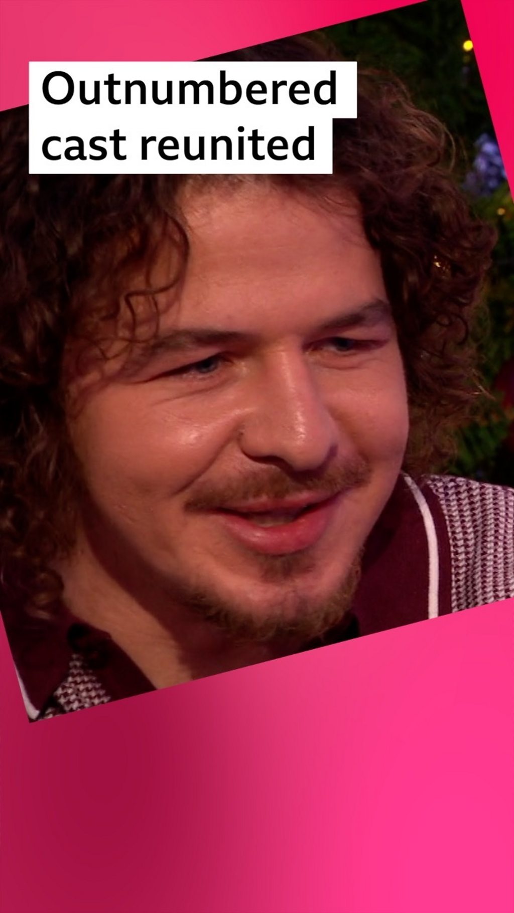 Actor Daniel Roche with a moustache and curly hair. Label text: Outnumbered cast reunited