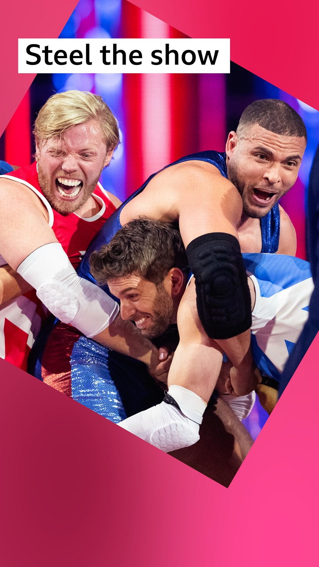 Three men - Rob Beckett, Steel the Gladiator and Joel Dommett - wrestle each other while wearing singlets