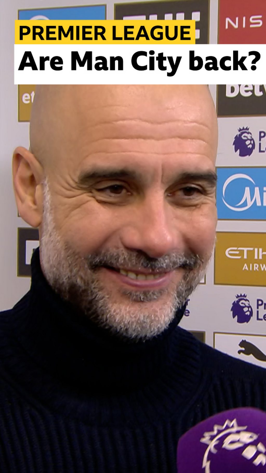 Pep Guardiola smiles