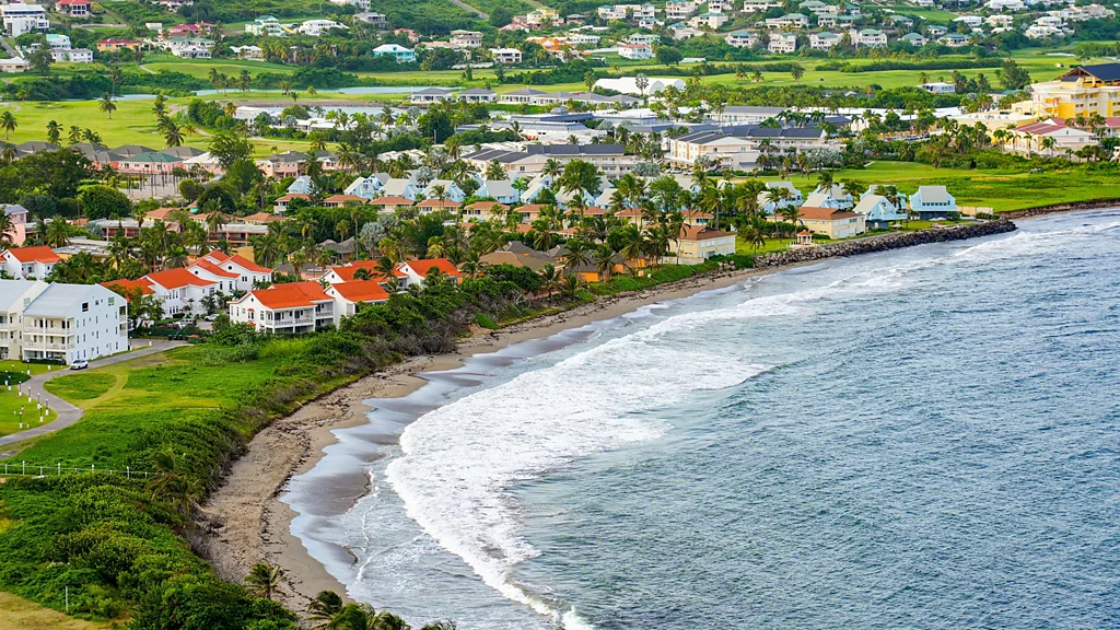A man carries bags at the entrance to an Air Canada Airport terminal (Credit: Getty Images)