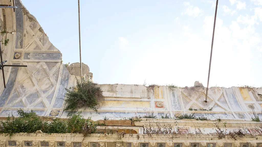 The ruins of the original Gibellina, abandoned after the 1968 earthquake, sit in contrast to the ambitious modern town built several kilometres away (Credit: Getty Images)