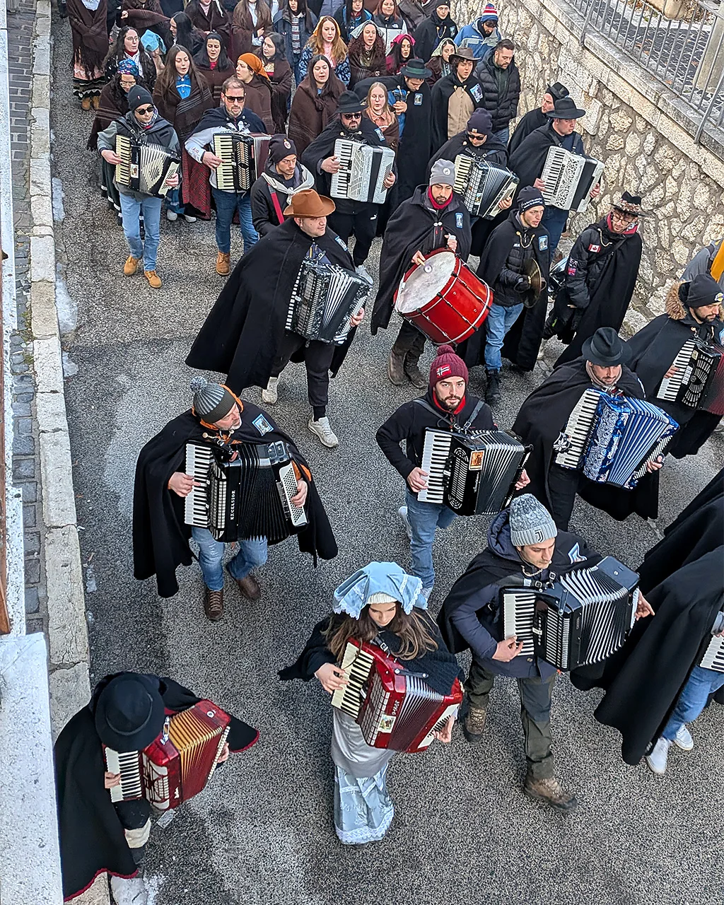 Traditional musicians provide a constant soundtrack to the festivities (Credit: Martino De Mori)
