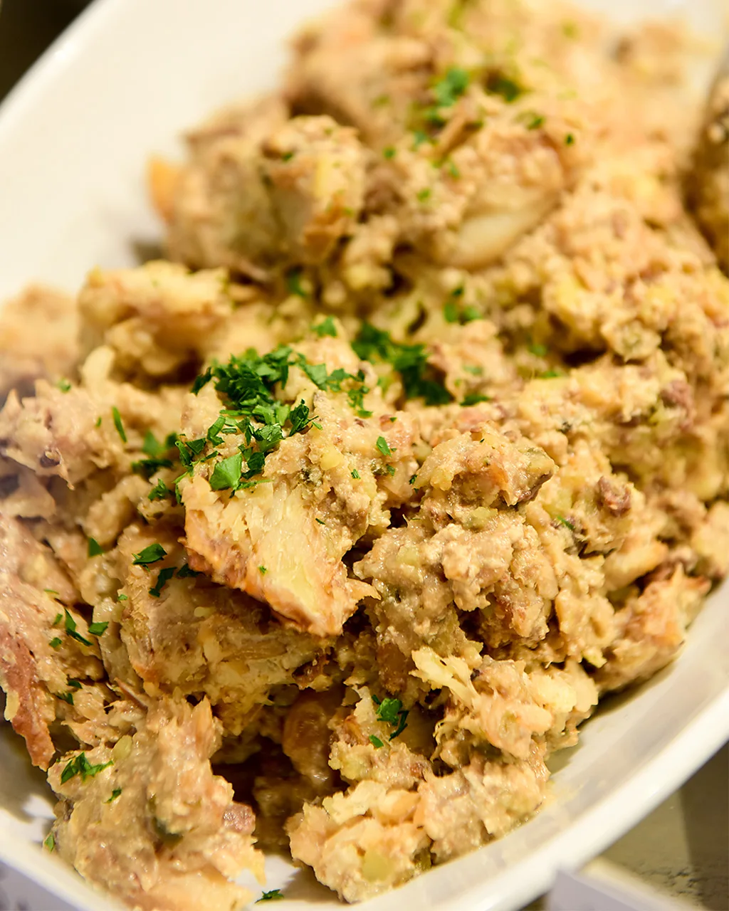 Baccalà alla Vicentina is a slow-cooked salt cod dish that takes many days to prepare (Credit: Getty Images)