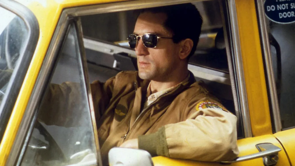 Robert De Niro in a taxi in a still from Taxi Driver (Credit: Alamy)