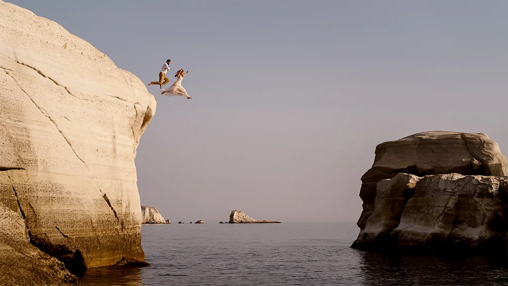 Greece's remote, volcanic landscapes are perfect for couples taking that leap of faith (Credit: Maddie Mae, Adventure Instead)