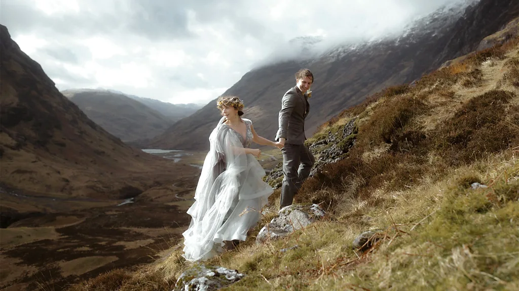 Hike through Scotland's ancient forests, otherworldly cliffs, misty lochs and castles for a fairy-tale elopement (Credit: The Caryls Photography)