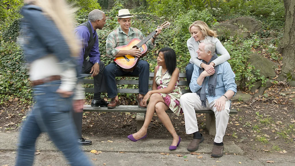 Engaging with music around other people can double the health benefits, research suggests (Credit: Getty Images)