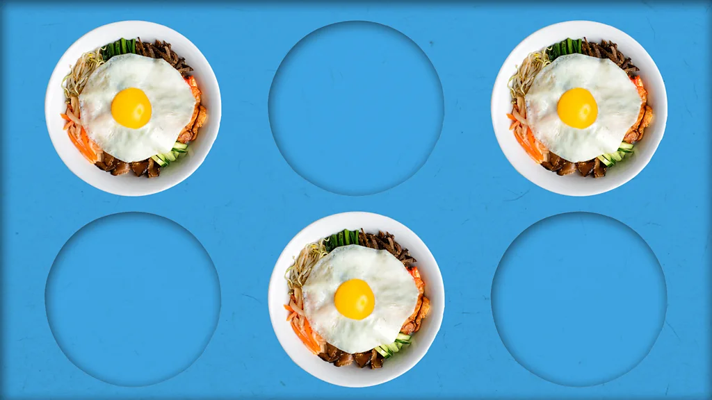 Five hands raise forks to the air, three of them have sausages on them (Credit: BBC/ Javier Hirschfeld/ Getty Images)