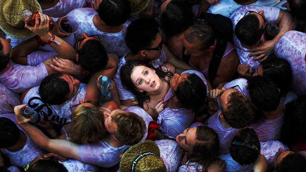 Girl in the crowd at San Fermin