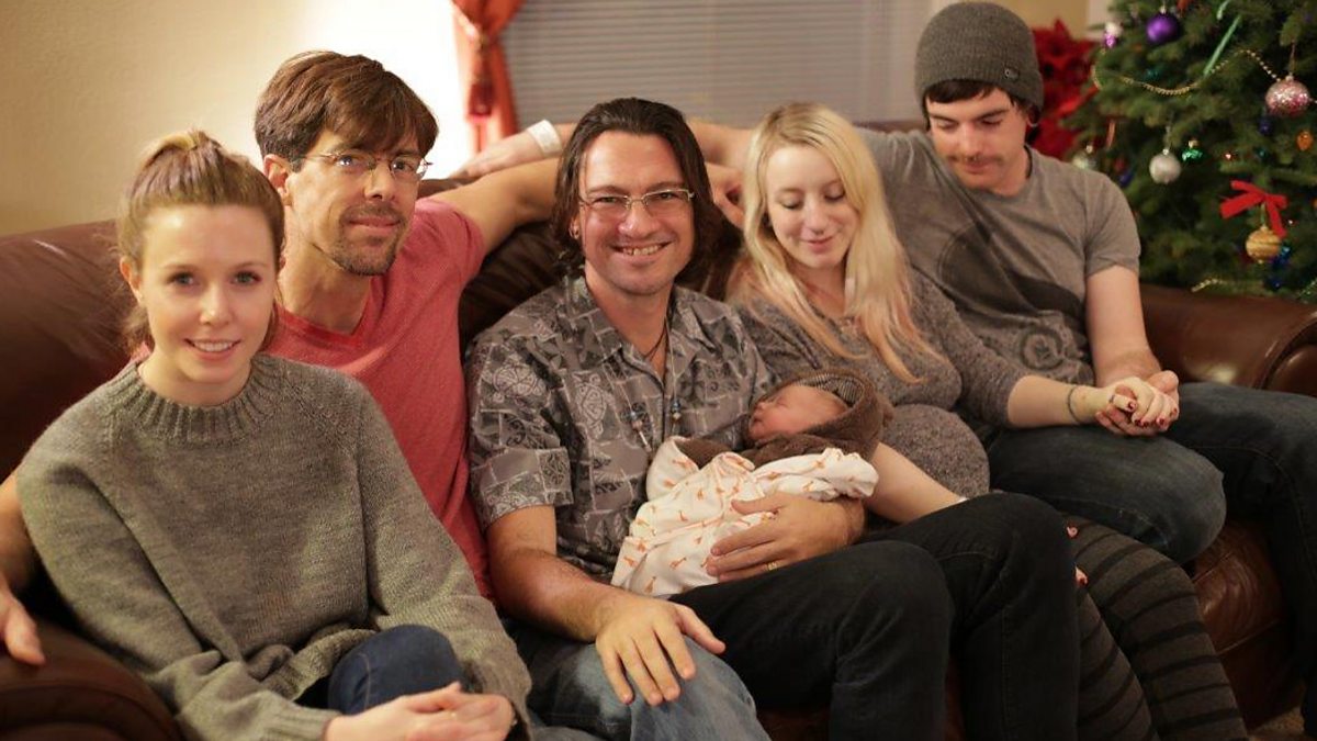BBC - Stacey with adoptive parents Frank and Jonathan holding baby