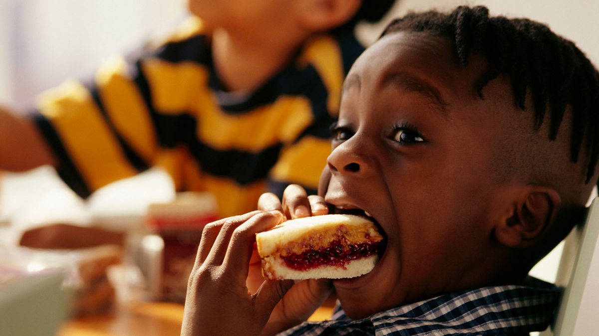 eating peanut butter sandwich