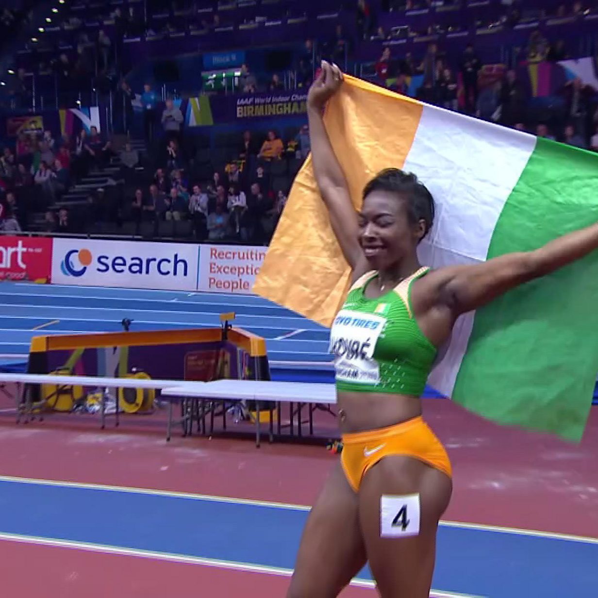 afhængige filosofi karton World Indoor Championships: Ivory Coast's Ahoure celebrates 60m gold with Irish  flag - BBC Sport