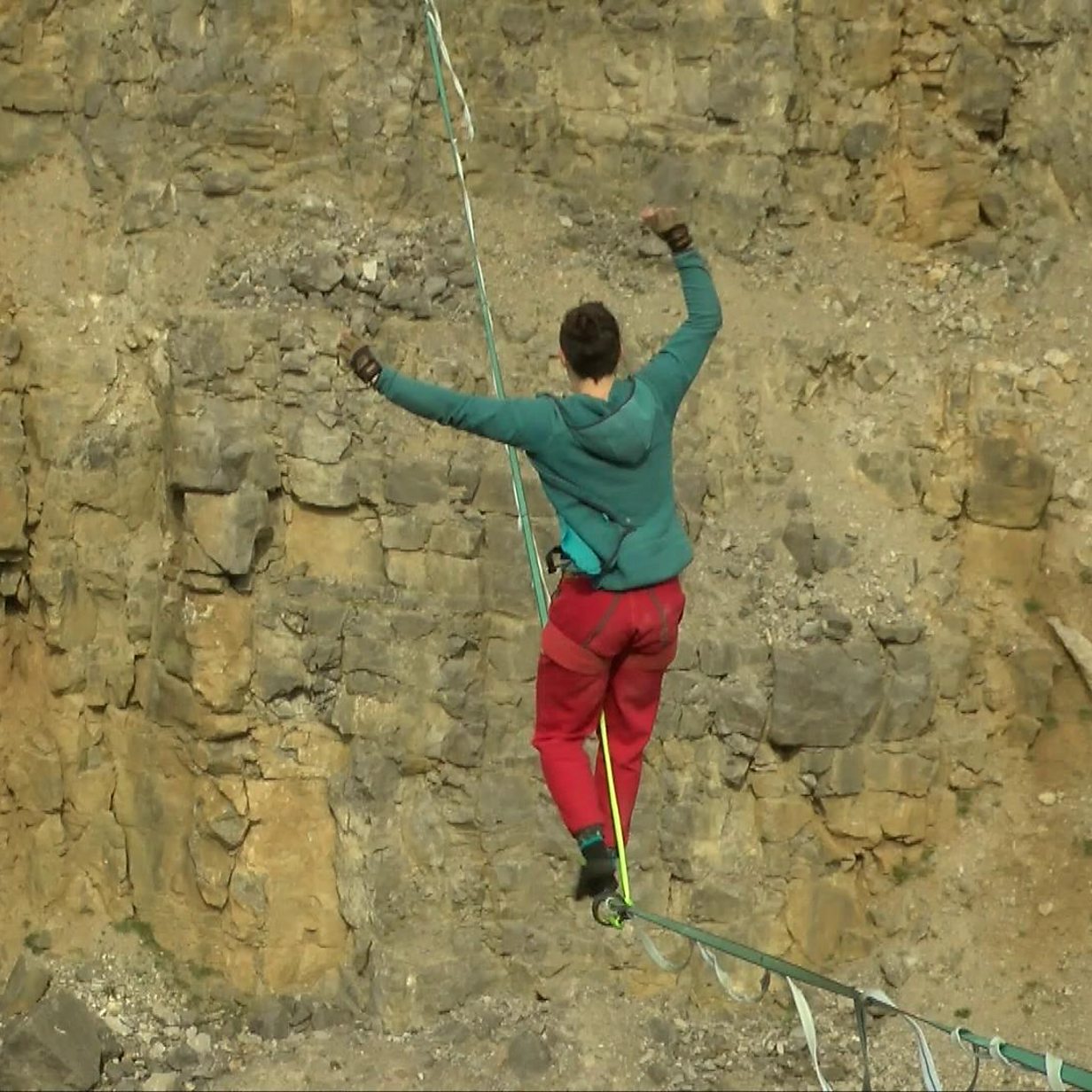 Walking on a 300m high tightrope without a harness - BBC News