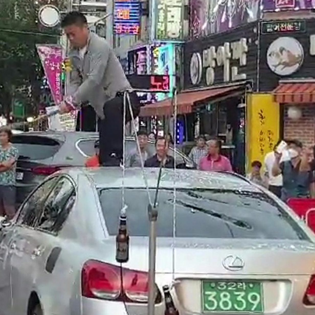 South Korean man smashes Japanese car in protest