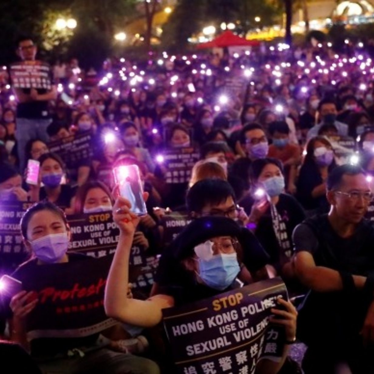 Hong Kong park lights up in sex abuse protest