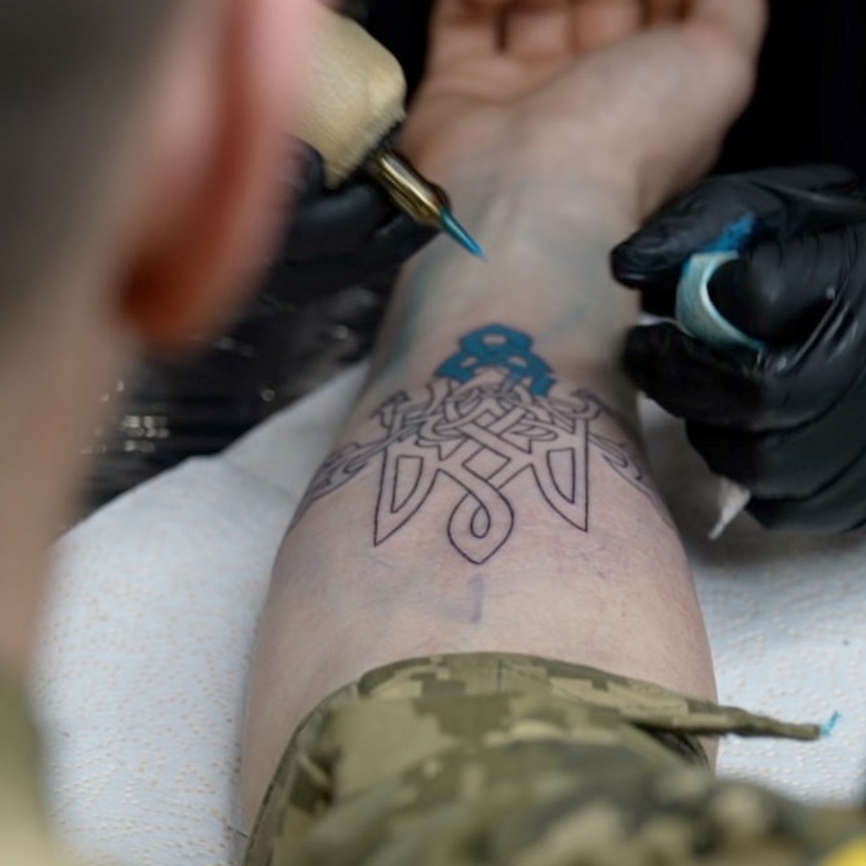 Patriotic tattoos, billboards popular in Ukraine | 11alive.com