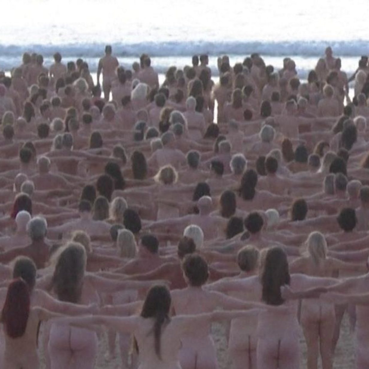 Naked volunteers pose for Bondi Beach artwork