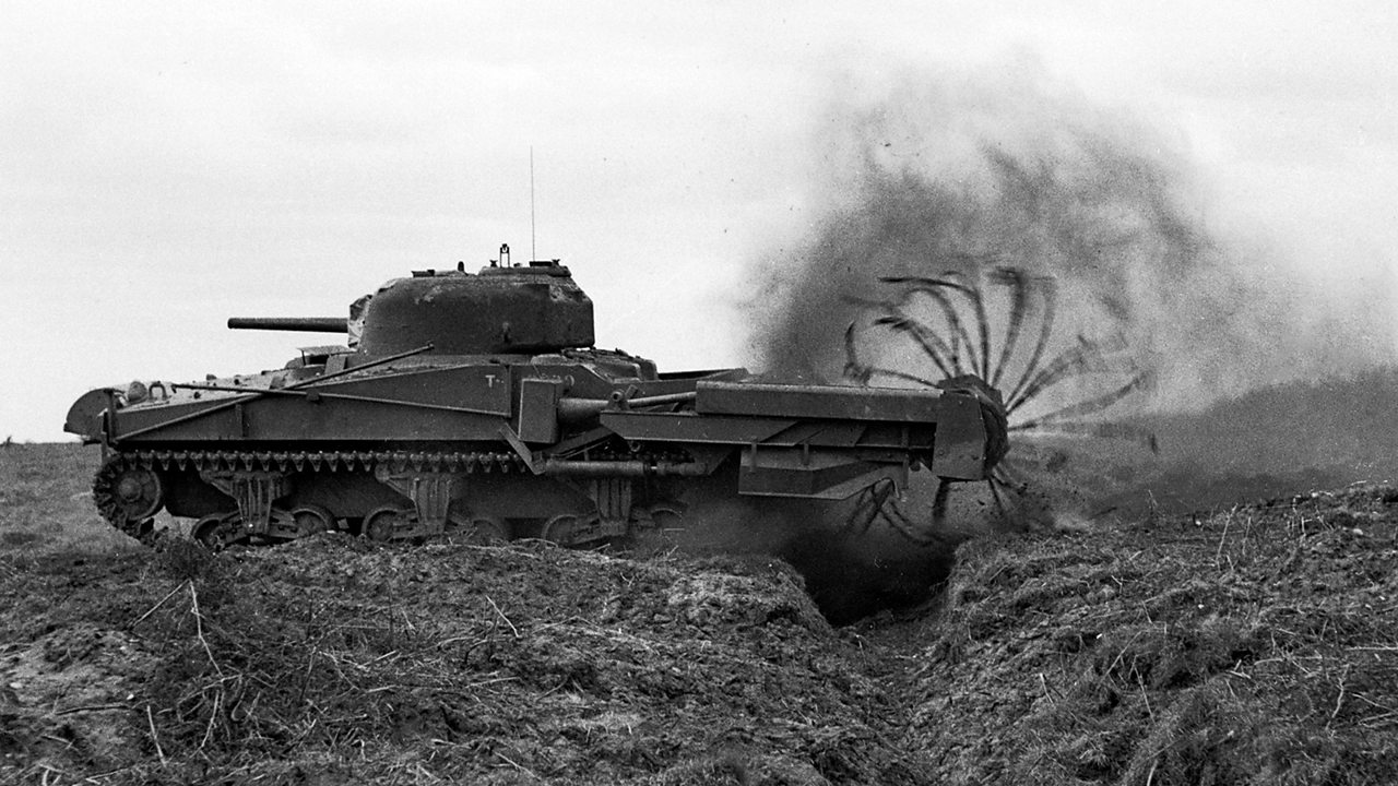 Photograph of a crab tank, fitted with a flail rotor to cut through barbed wire.