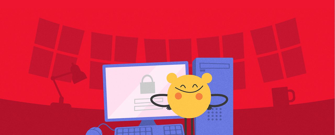 Cartoon character stood behind a computer