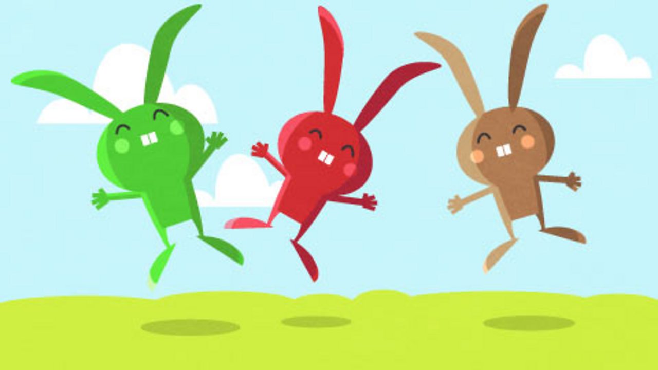 Three illustrated rabbits, each a different colour.