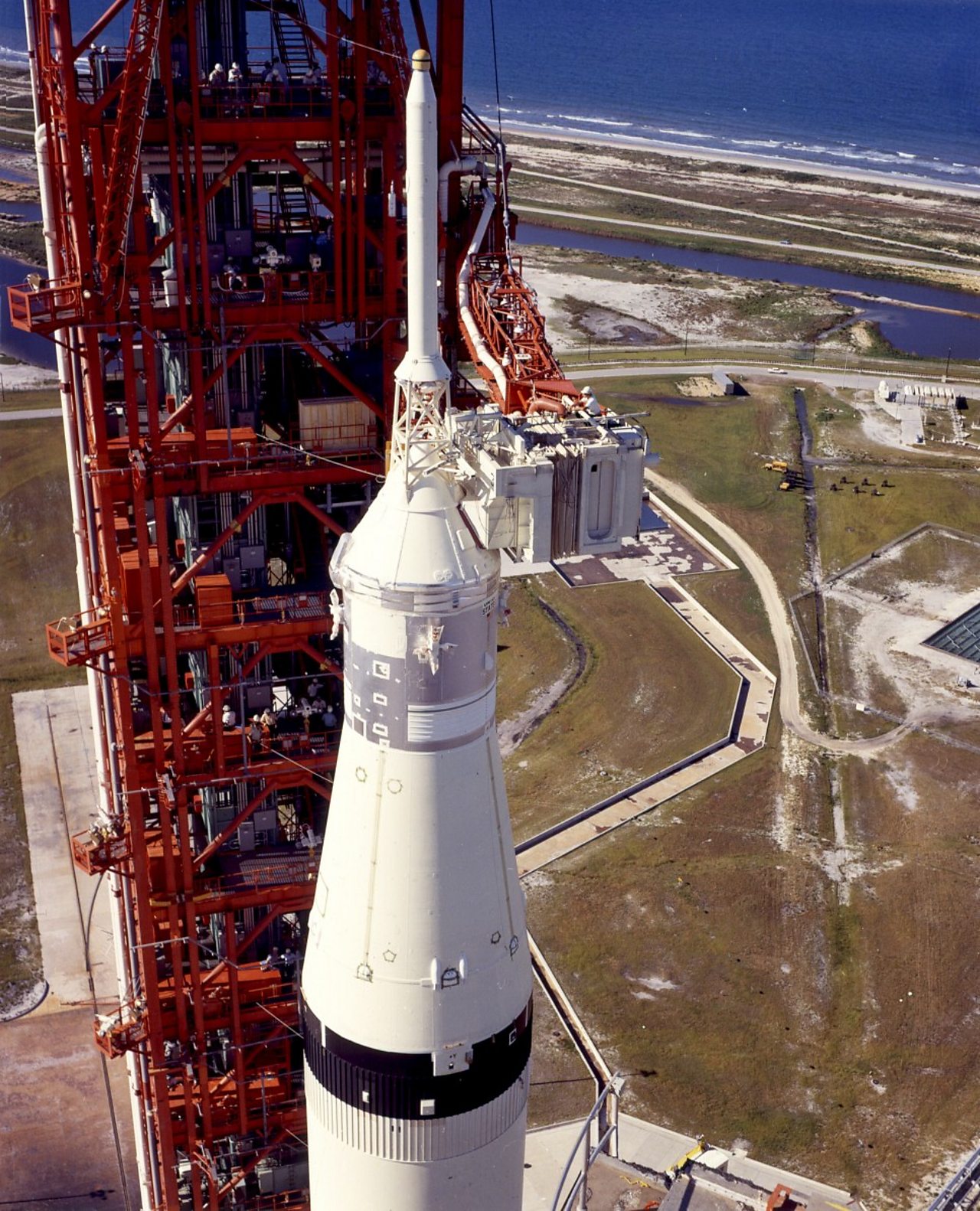 Technicians working on the Saturn V before launch.
