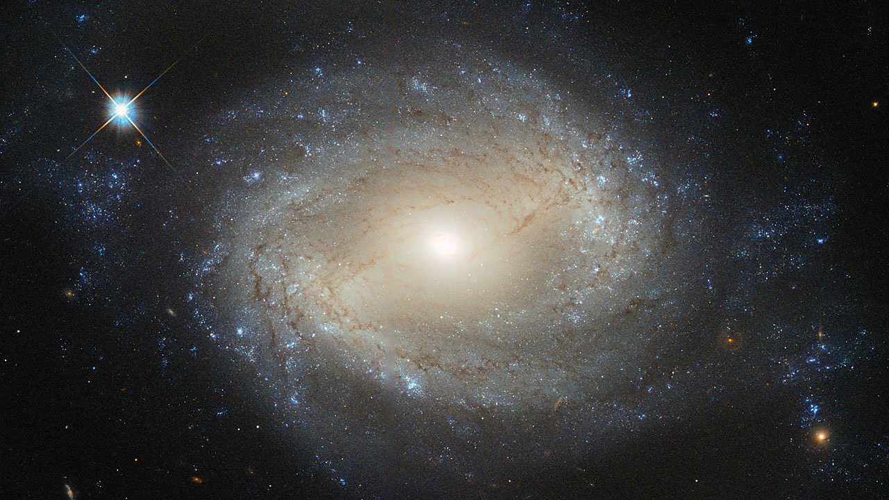 A swirling spiral galaxy in space.