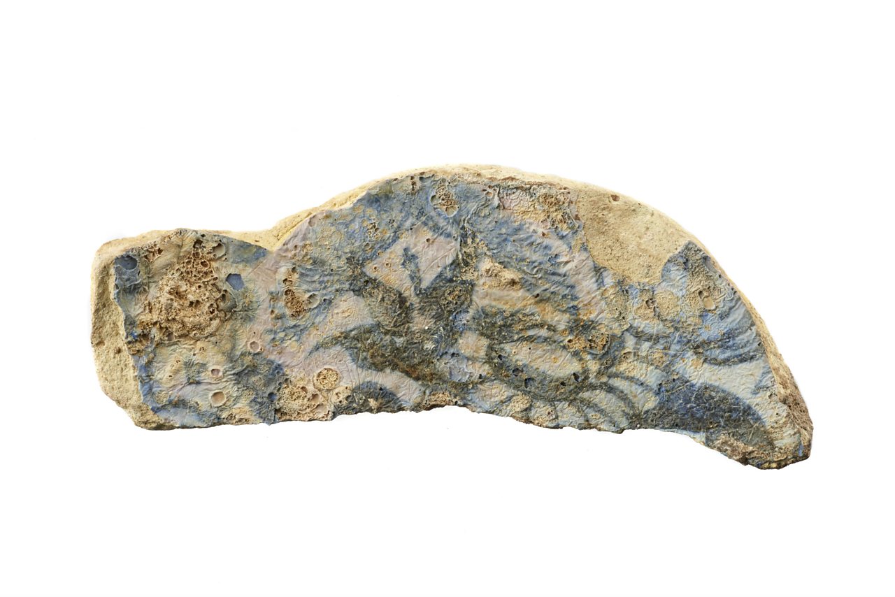 This is a burnt plate fragment recovered from Pudding Lane © Museum of London