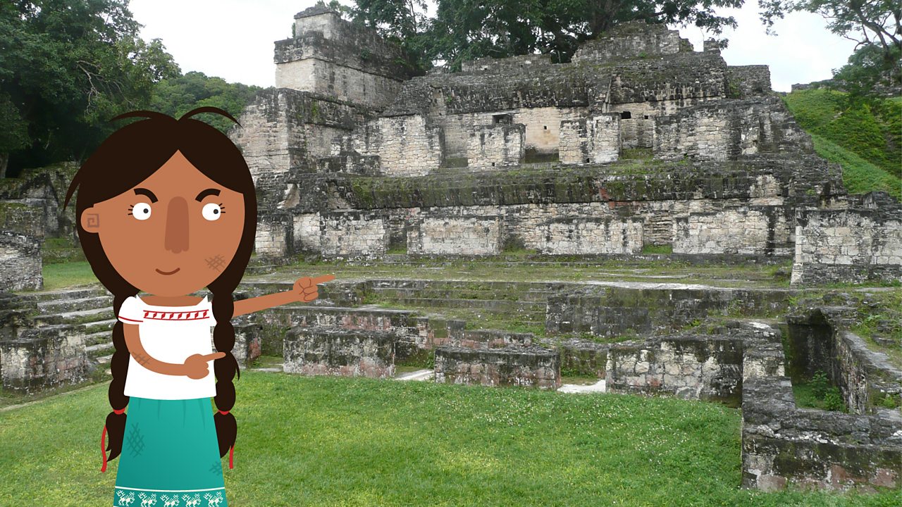 Jade pointing out the North Acropolis, which was a large Maya cemetery.