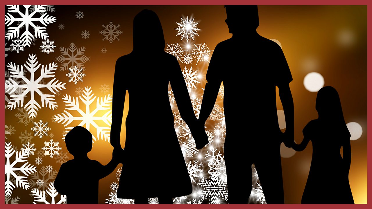 A silhouette of a family superimposed on snowflakes