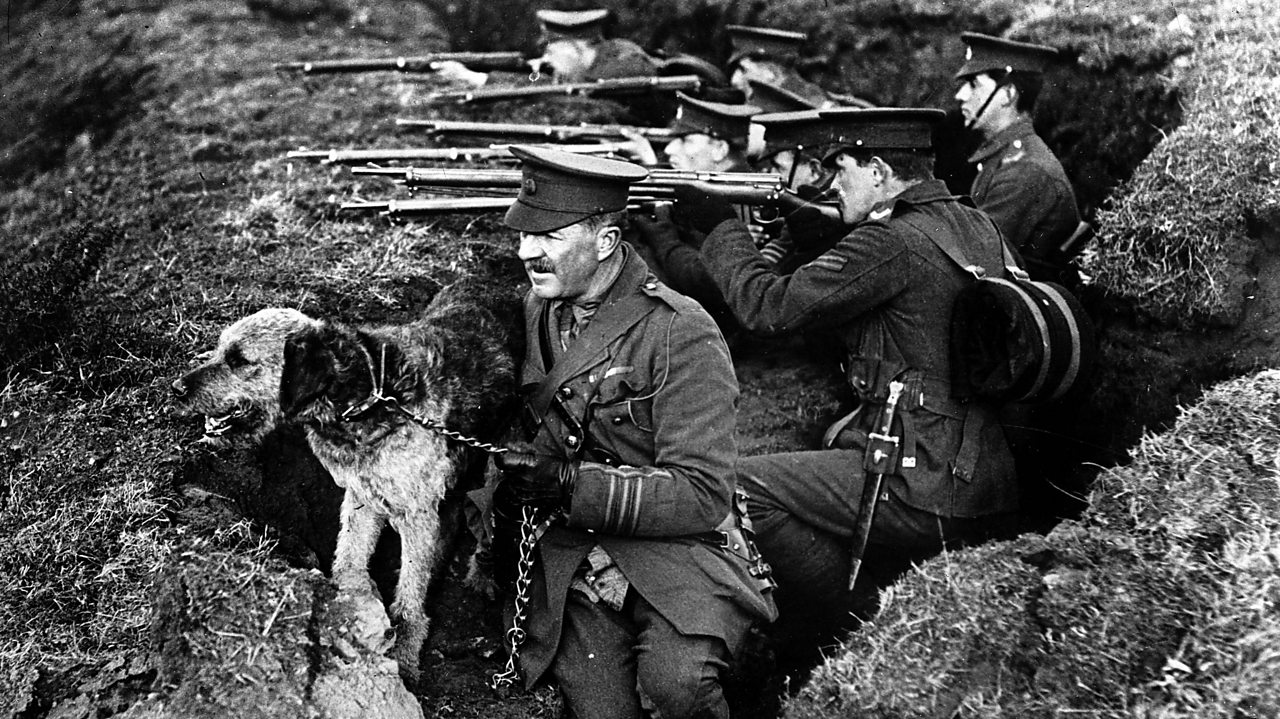 Lieutenant Colonel Richardson with fellow soldiers and one of his dogs in a trench circa 1914