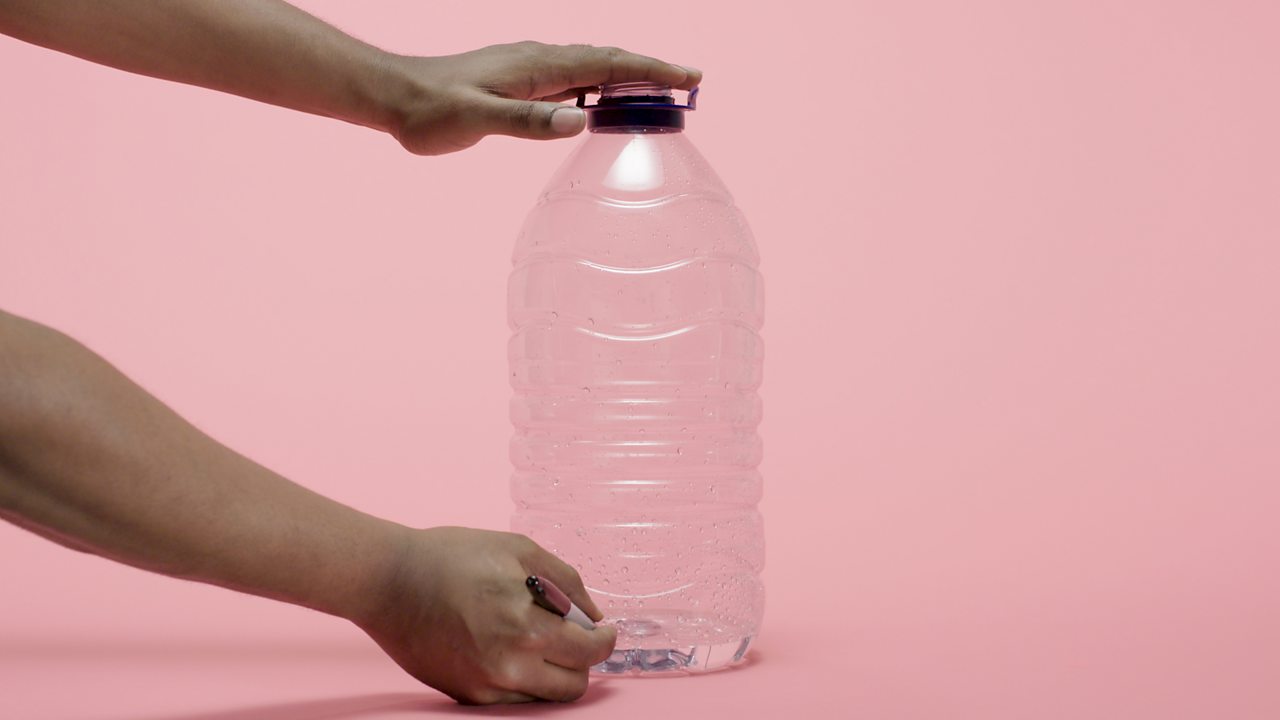 Measure out 200 ml of water into the bottle and put a mark where it goes up to. Repeat until you get to the top of the bottle.