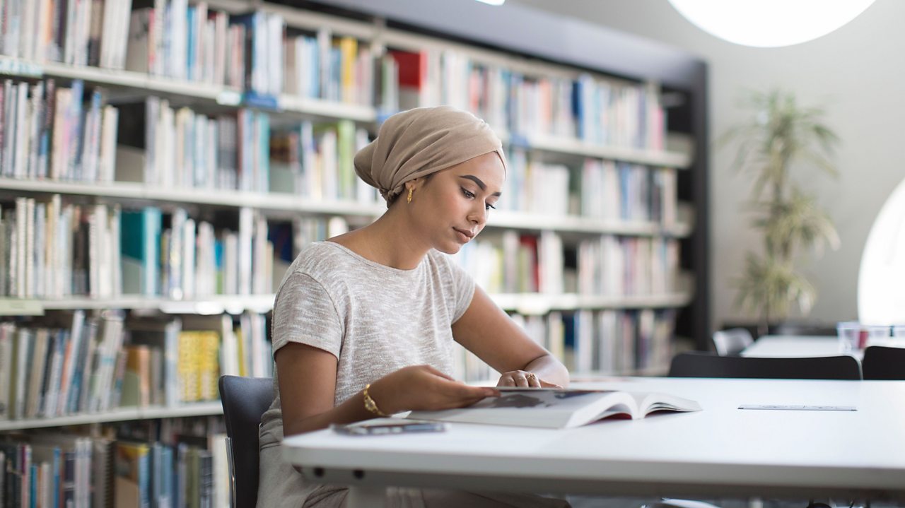 Girl revising in the library
