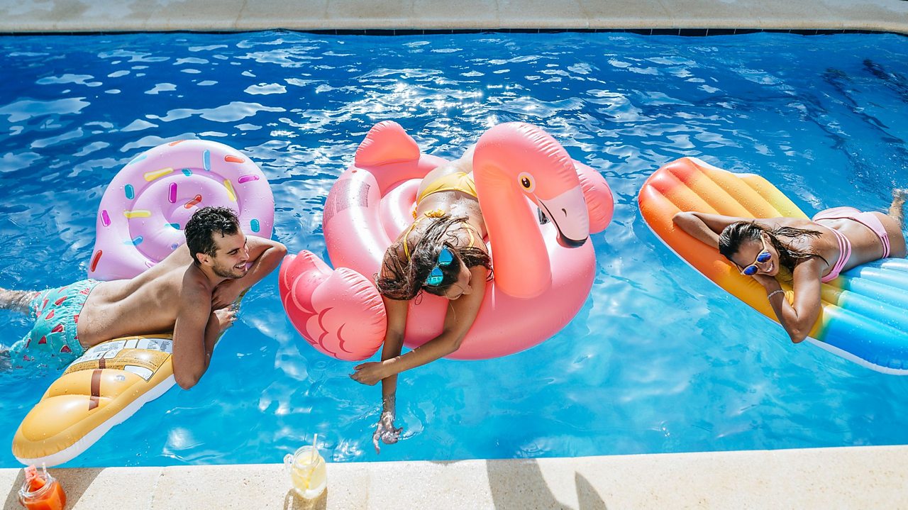 3 friends in a swimming pool