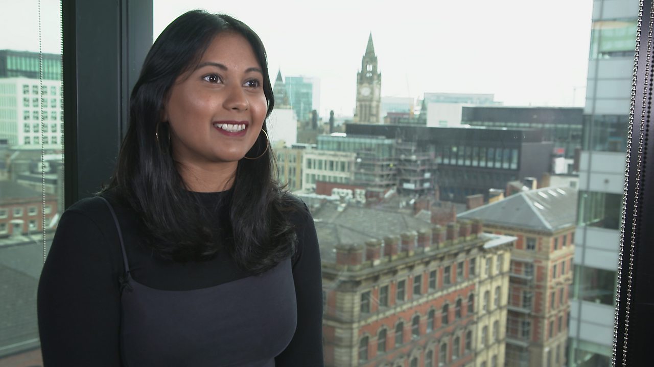 Farhana smiling.