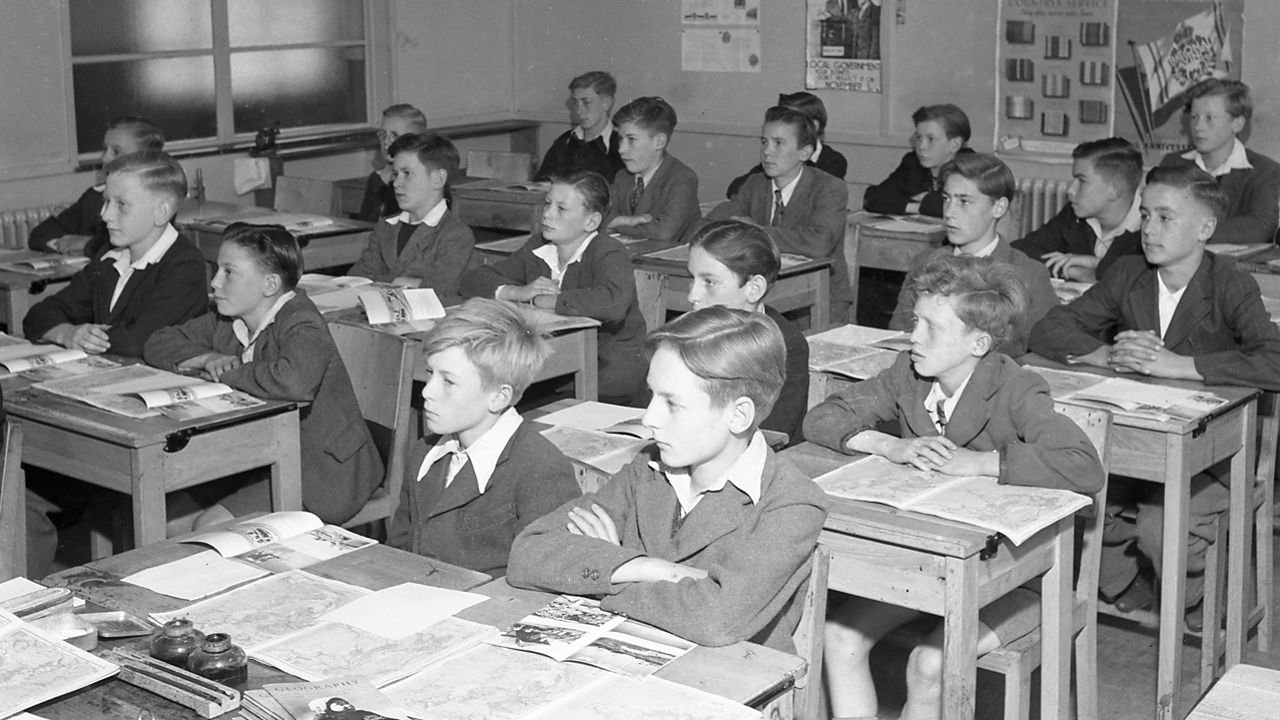 1949 BBC Broadcasts To Schools: A class in a junior mixed school listening to a broadcaster.