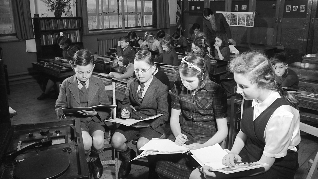 1945 BBC Broadcasts To Schools: The senior pupils of a small rural school listen to a current affairs broadcast.