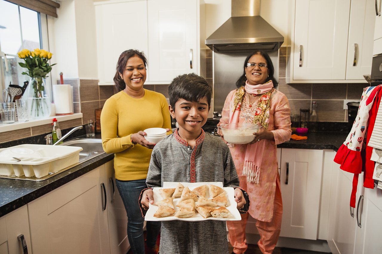 Family preparing food to break their Ramadan fast.