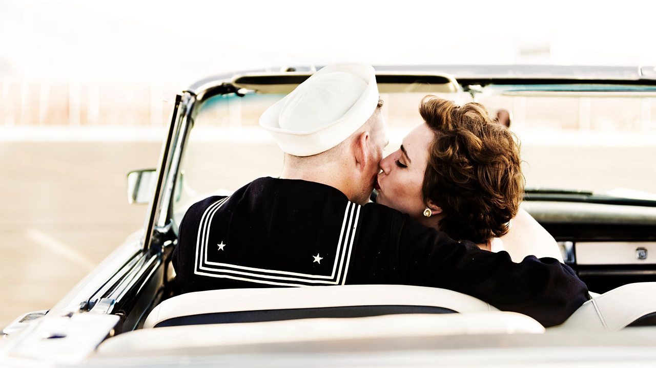 Couple kissing in car
