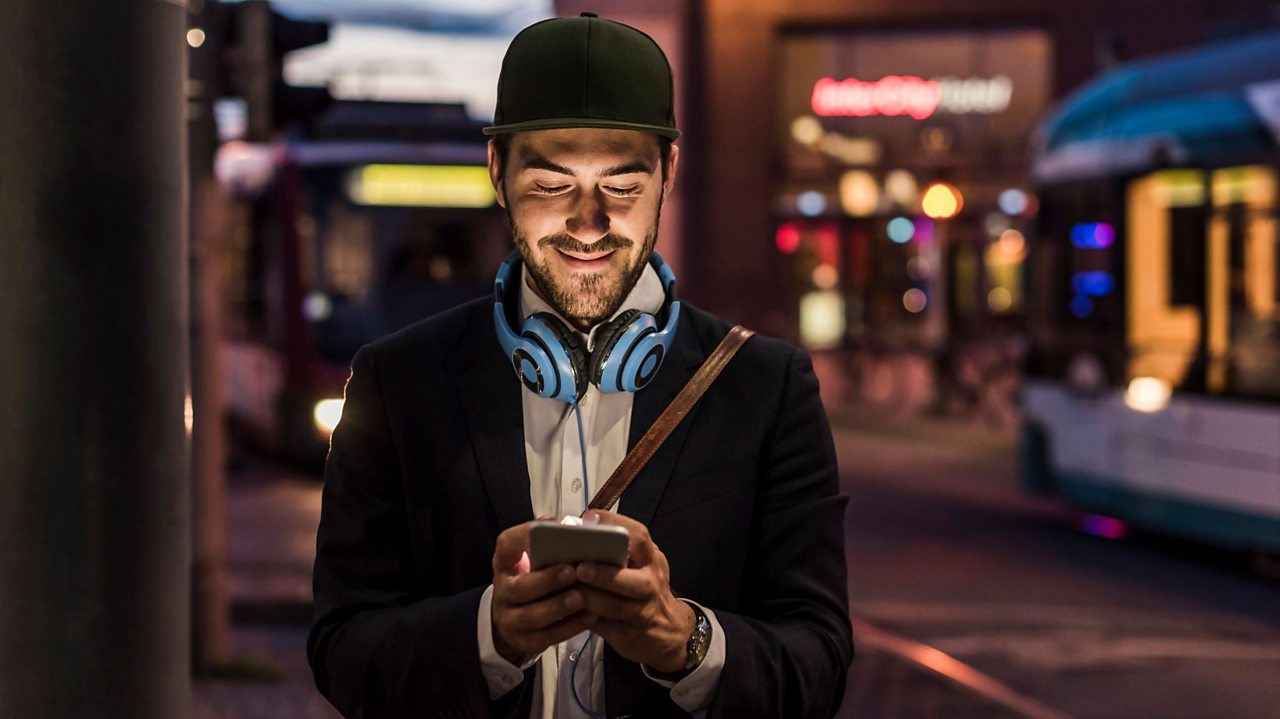 Man walking home on phone