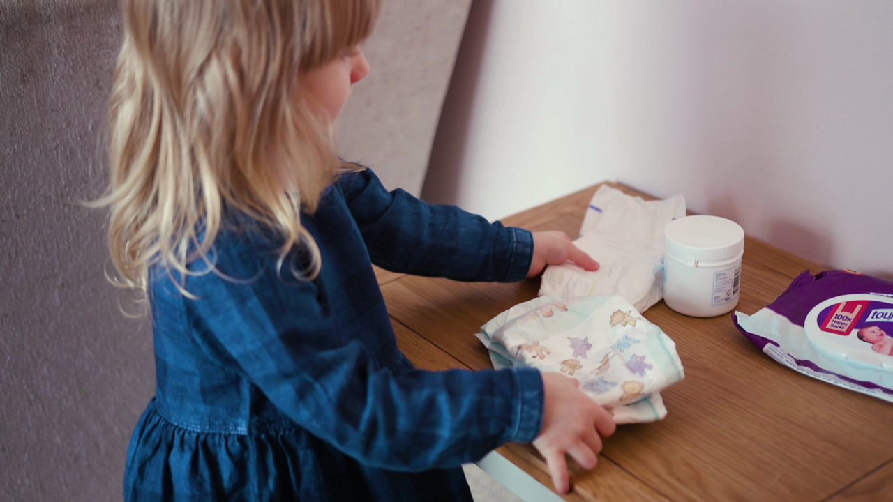 New Siblings Asking your child to help change nappies BBC Tiny Happy