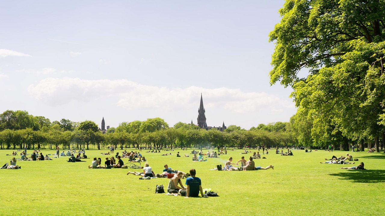 People relax in the park in Edinburgh