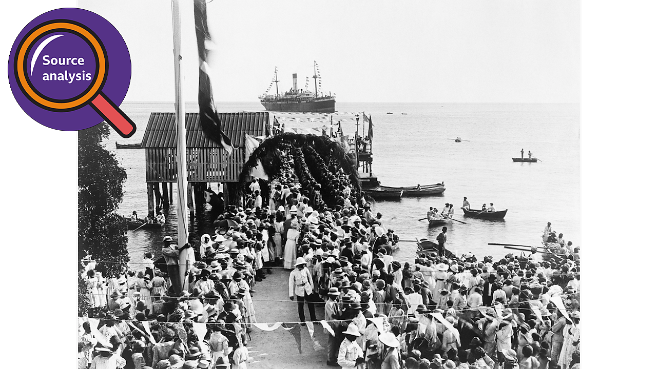 A crowd waiting at a St Vincent port for a ship transporting the BWIR to dock.