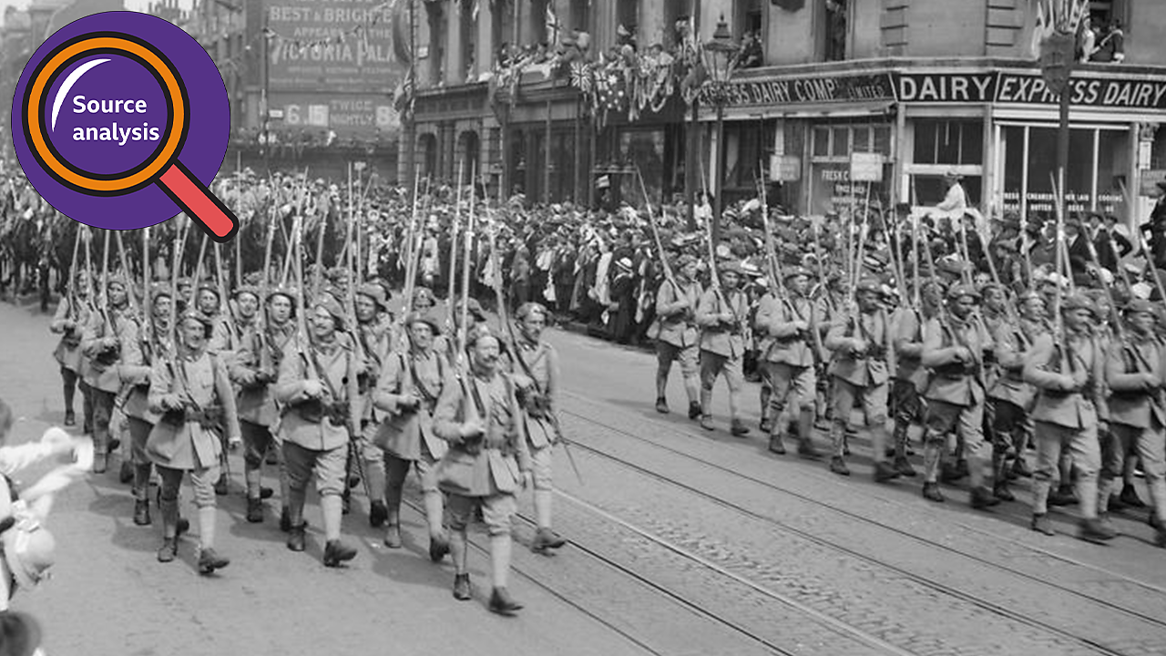 Regiments from Czechoslovakia marching past rows and rows of crowds.
